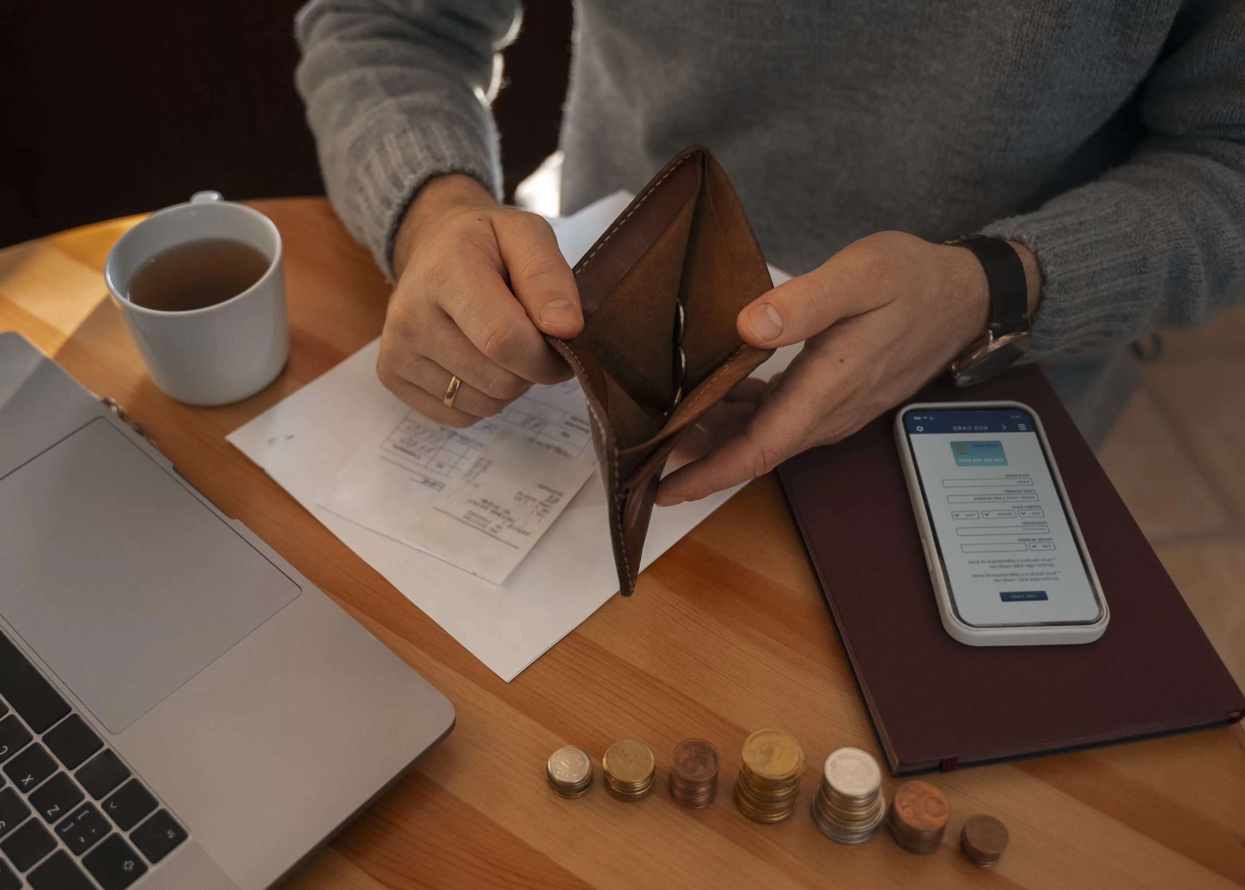 man browsing his wallet